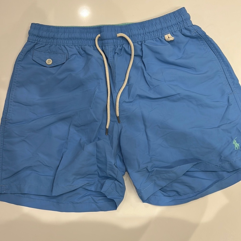 Polo Ralph Lauren, men’s medium bathing suit. Dark Suit is Men’s Small